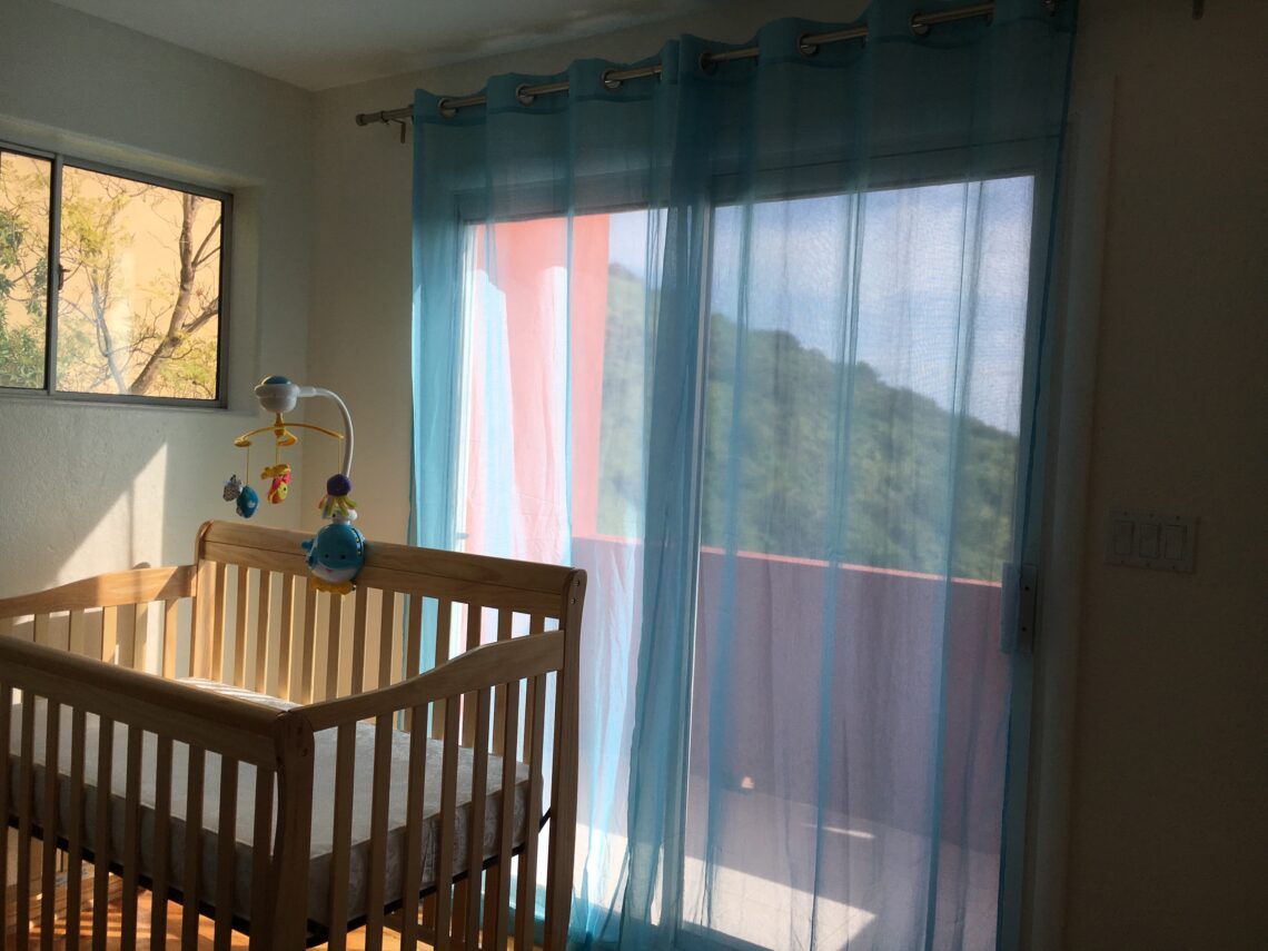 Cover Image of a New Nursery in Malibu with the Delta Children Canton 4-in-1 Convertible Crib Neutral Midcentury Modern Mood