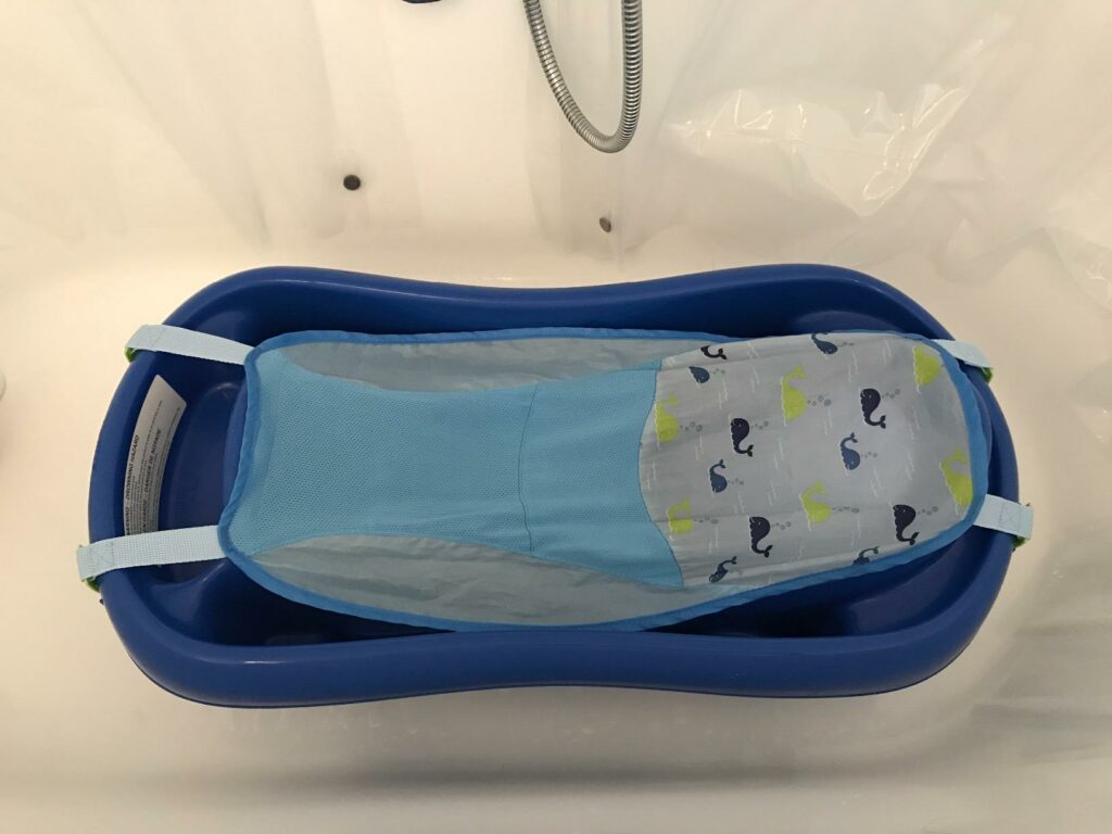 1st Years Sure Comfort Deluxe Plastic Infant Bathtub with Sling Hammock in Blue Whale