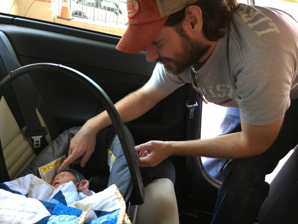 Nicu Graduate Going Home in the Cosco Dream Ride Latch Car Bed with Mom and Dad