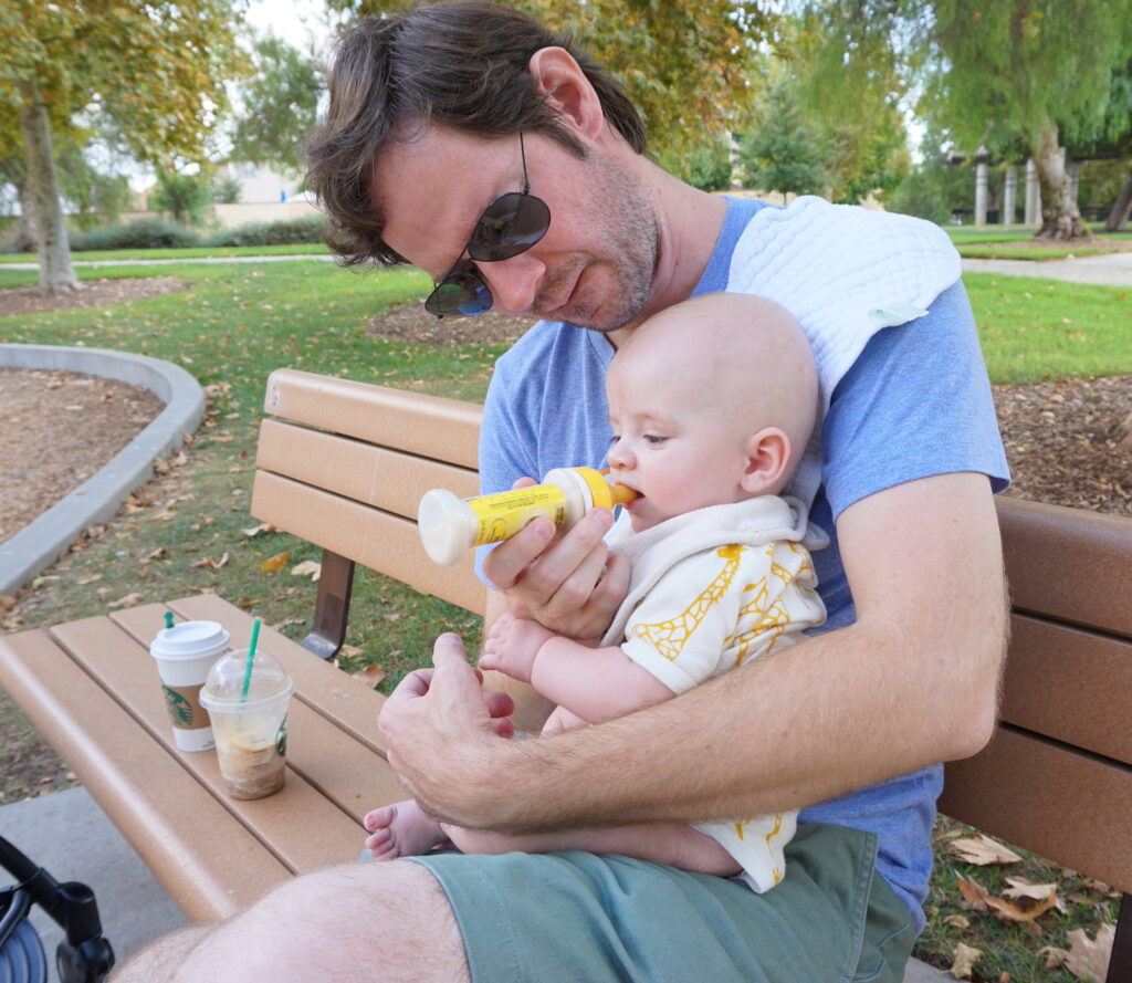 Baby hungry in the park no problem with the enfamil ready to feed infant liquid formula with natural nipple teat