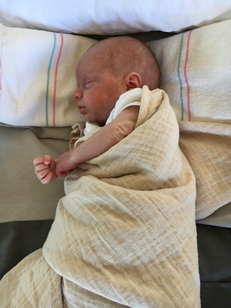 Swaddled Preemie taking a nap after a Dr. Brown's Preemie Baby Bottles feeding