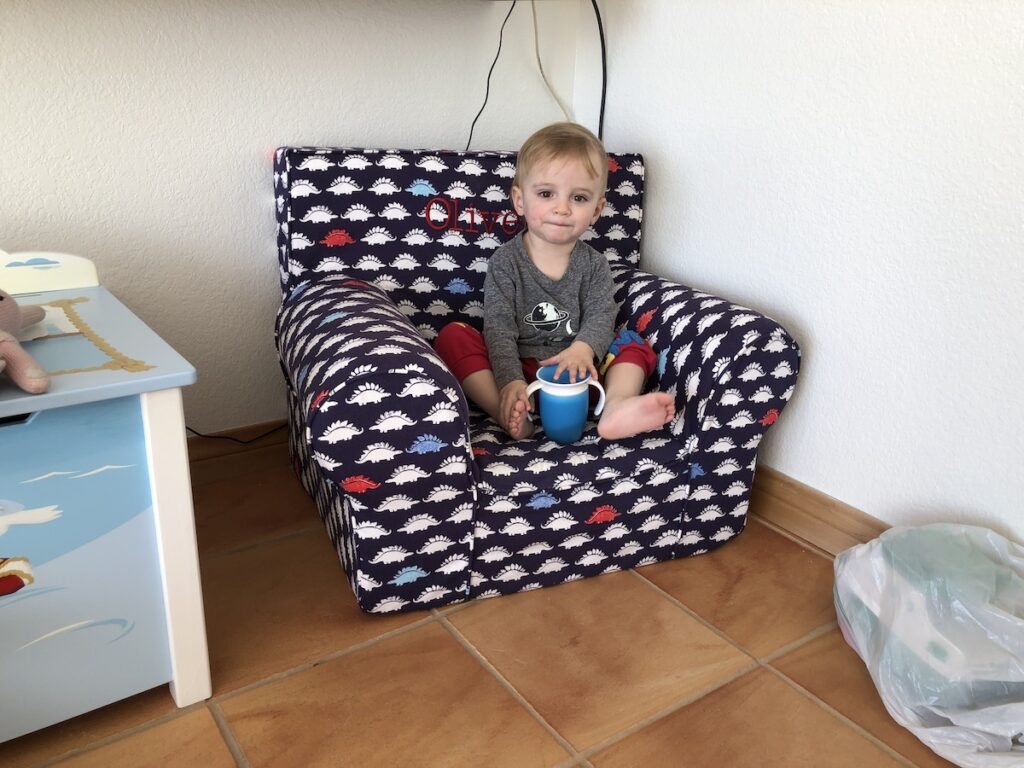 Toddler Sitting in the Pottery Barn Kids Anywhere Chair