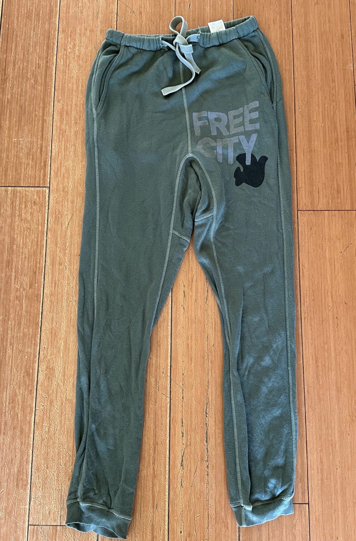 Free City Fluffy Luxury Superfluff Pocket Lux Lounge Pant in Vintage Bush Green Dove Logo Print on Hip