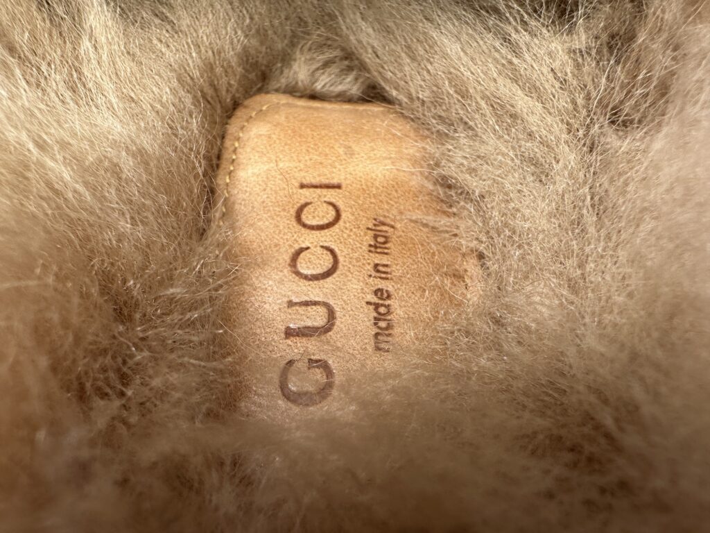 Gucci Fur Shearling Slippers Have a MADE IN ITALY leather patch hidden between the furry interior sole. Little luxurious touches from a Luxury Brand!