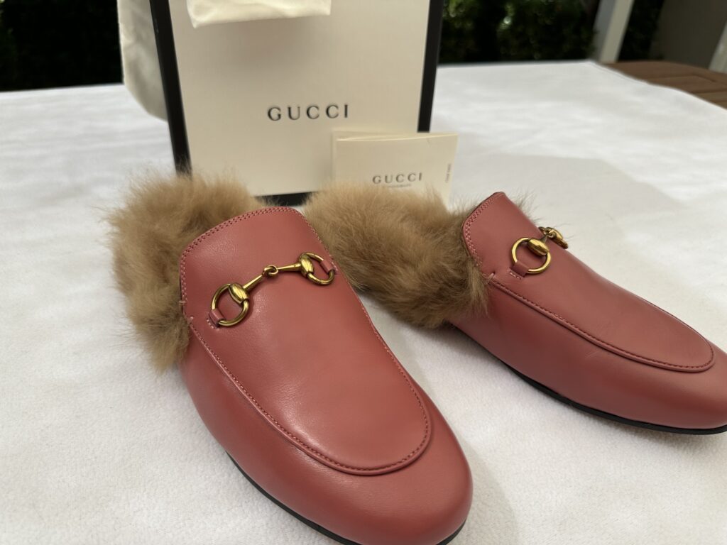 Gucci Princetown Shearling Fur Lined Slip On Mules Loafers Slippers have a trendy and timeless elongated toe