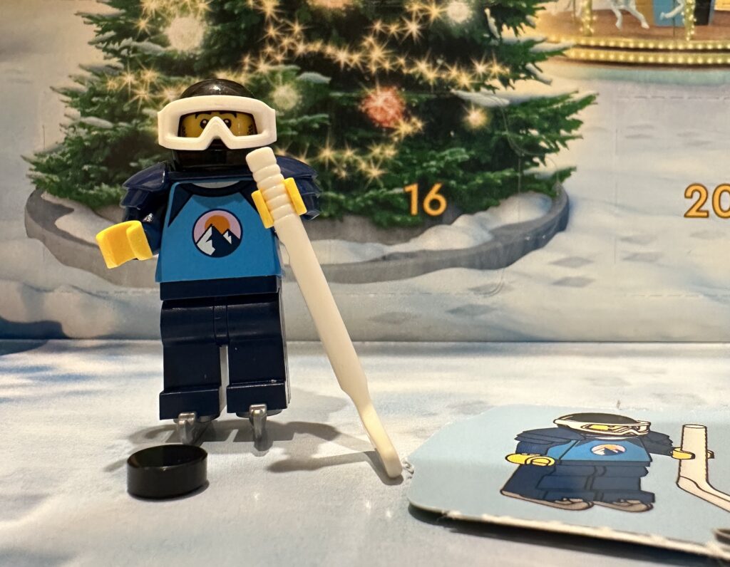 Day 4 Lego Advent Calendar City Version is a Hockey Player Minifigure MiniFig with Hockey stick and two 2 pucks