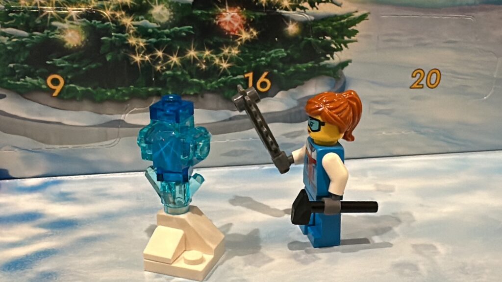 Day 7 of the LEGO City Advent Calendar 7th Door Revealed a Minifig Ice Sculpture Artist Lady with a Chainsaw and Hammer