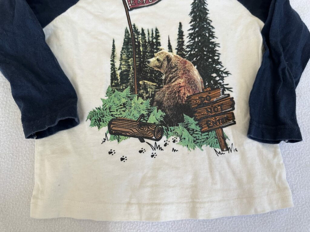 Stella McCartney Kids Explore Do Not Enter Graphic Baseball Tee for Boys Features a Bear in Woods from the Camping / Camp print collection