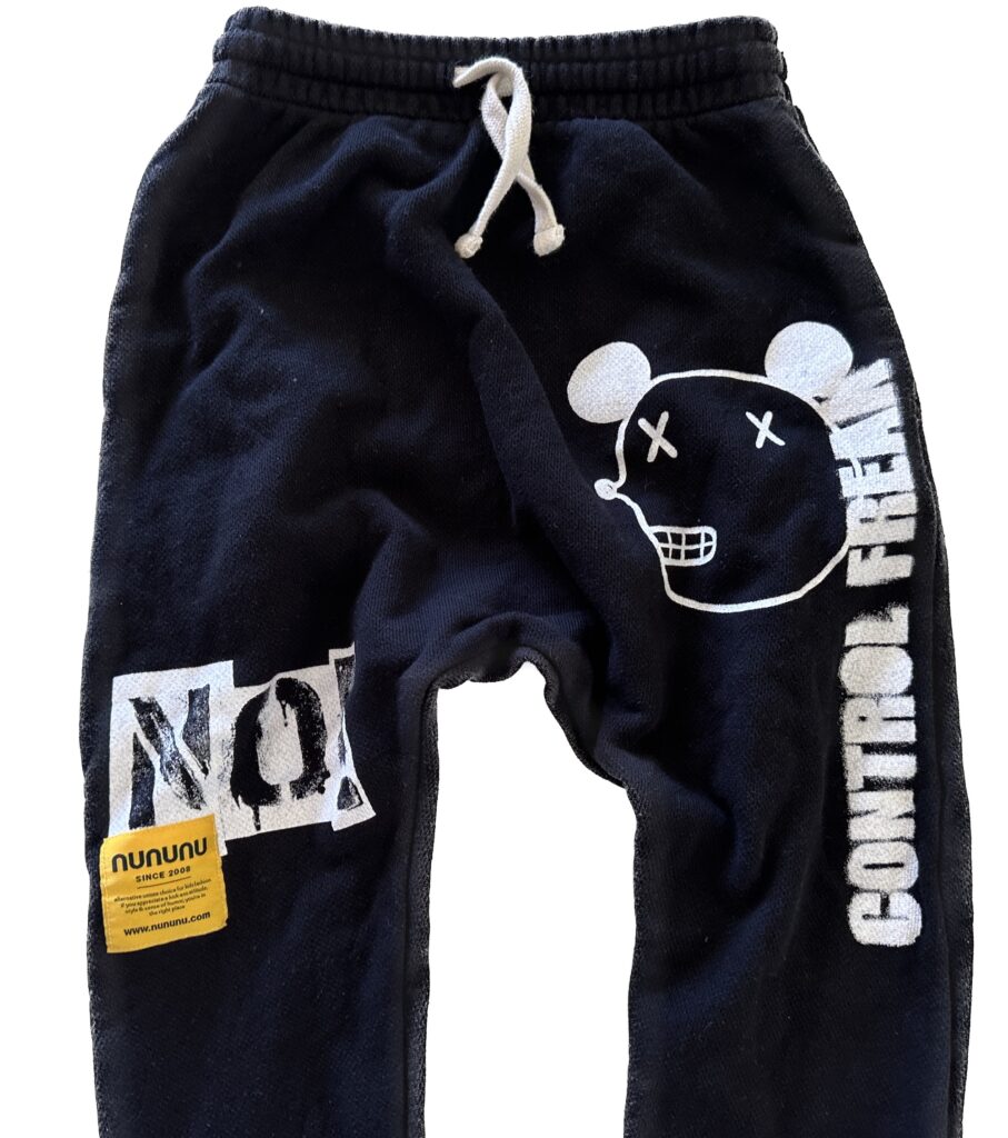 Nununu NO! Mousy Control Freak White Graphics on Black Pants Photo of Details