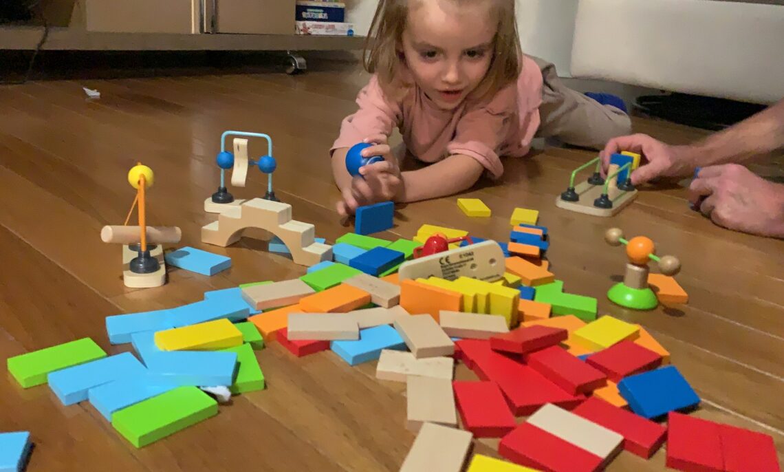 Introducing Toddlers and Little Kids to Their First 1st Wooden Toppling Domino Set from Hape Early Explorer Dynamo Dominoes Game