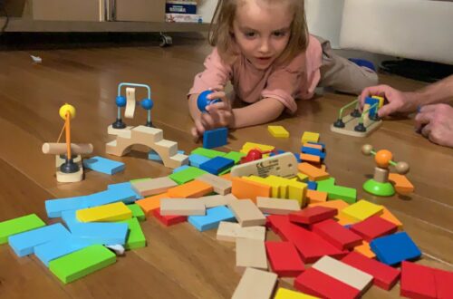 Introducing Toddlers and Little Kids to Their First 1st Wooden Toppling Domino Set from Hape Early Explorer Dynamo Dominoes Game