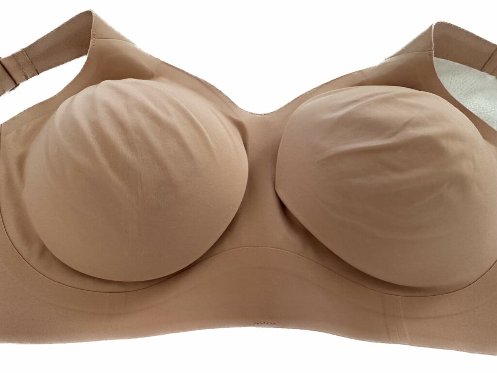 The beyond bra molds to your shape within 2 to 3 wears. The cups are seamless and contouring and will not show even when wearing the tightest t-shirts and blouses.