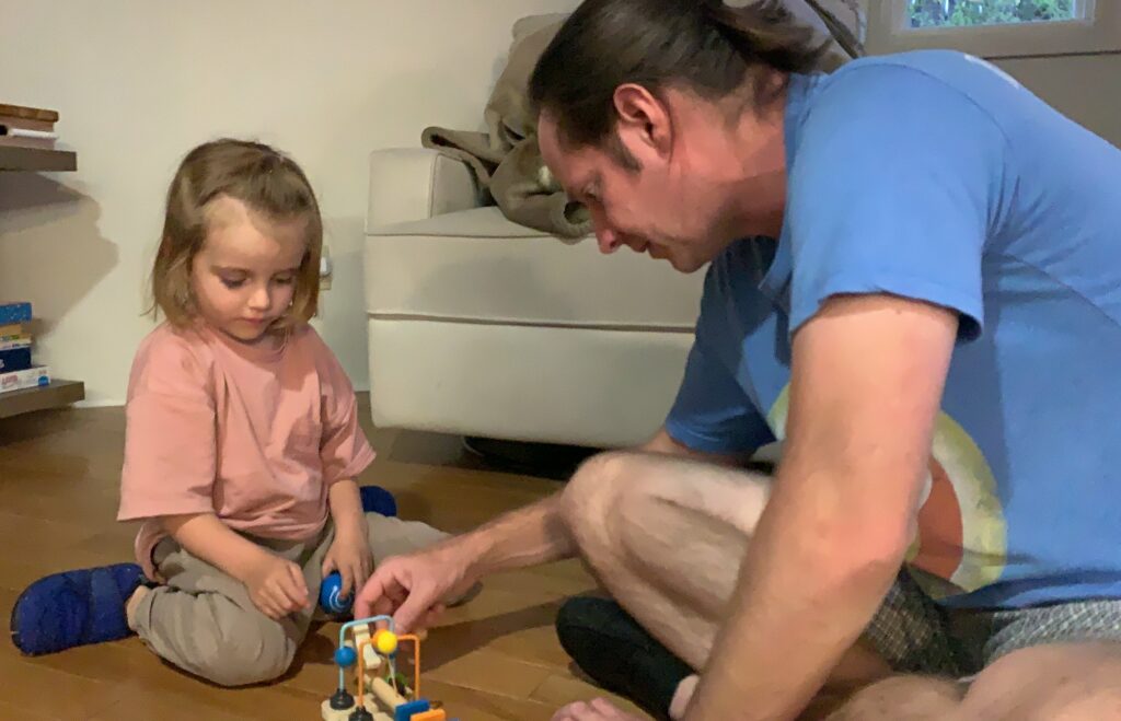 Toppling Dominoes is a great STEM and STEAM activity parents and caregivers can do with their toddlers and little kids